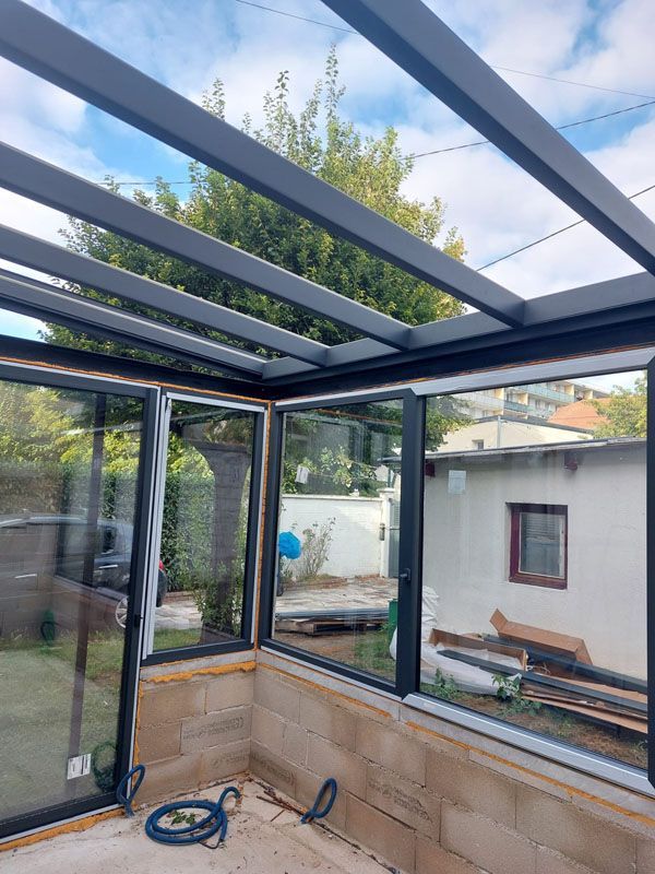 Véranda maçonnée à Colombes 06.