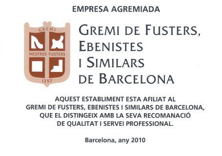 Logo of Gremi de Fusters, Ebenistes i Similars de Barcelona. Text states the establishment is affiliated with the group.