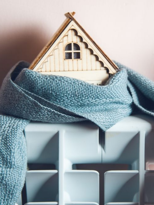 Une petite maison sur un radiateur
