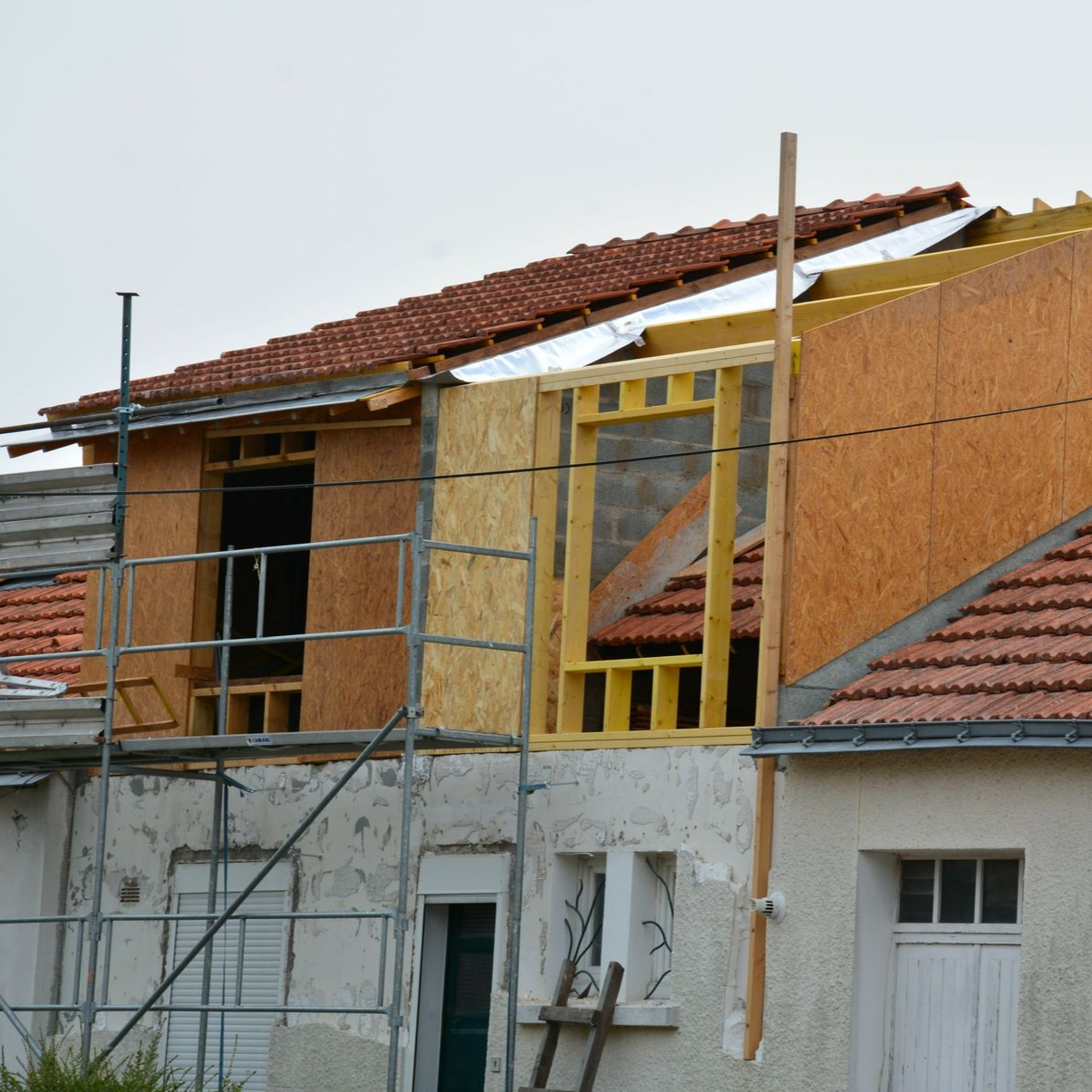 Surélévation de maison en deux parties