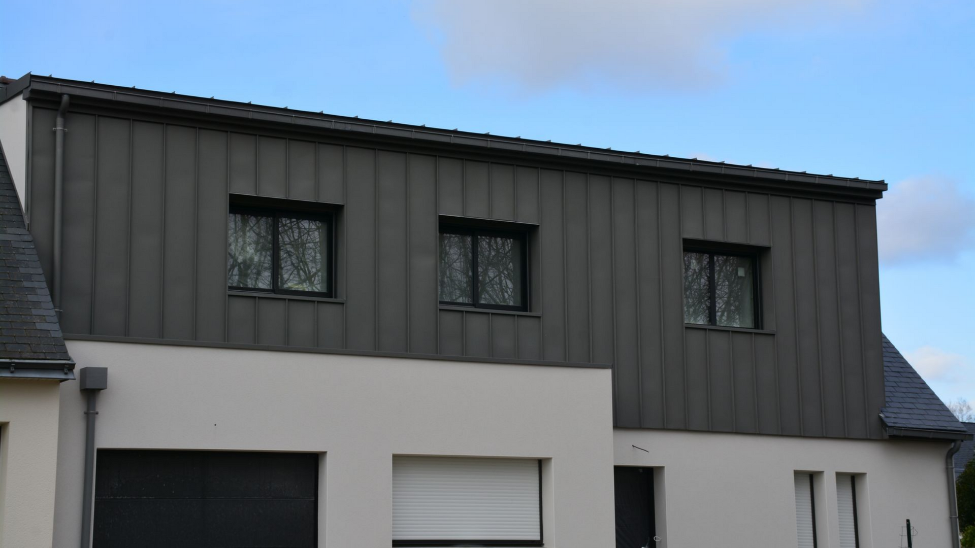 Surélévation avec bardage en zinc