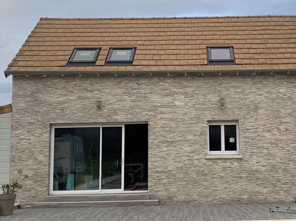 Pose de pierres sèches et de Velux