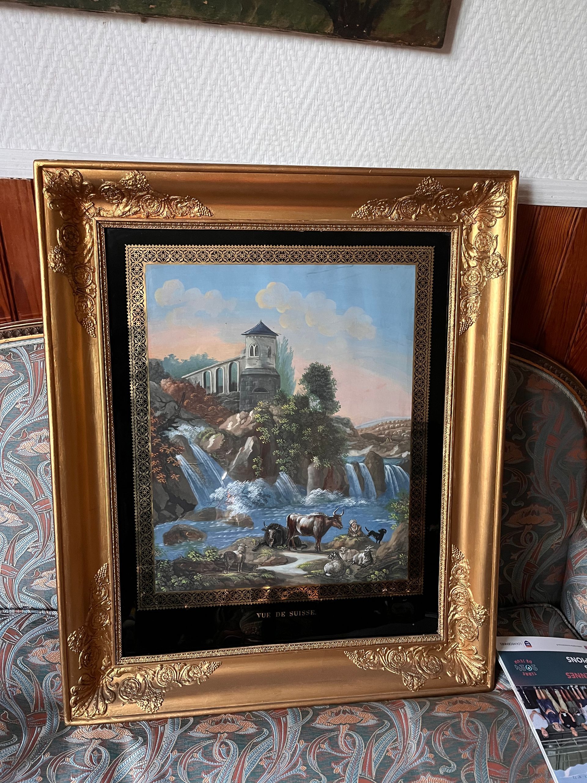 Tableau représentant un paysage avec un château au dessus d'une cascade