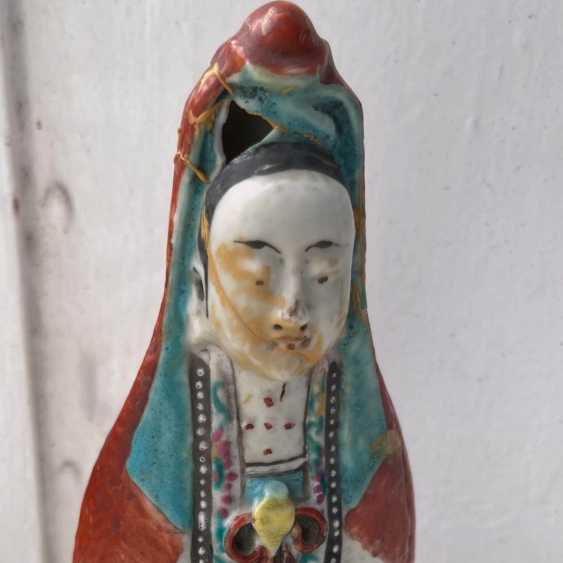 Statue en porcelaine asiatique