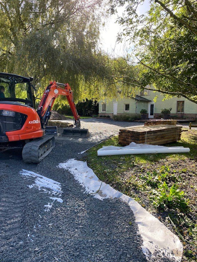 Terrassement d'une allée et d'un parking