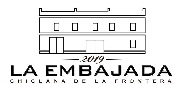 A black and white logo for la embajada chiclana de la frontera
