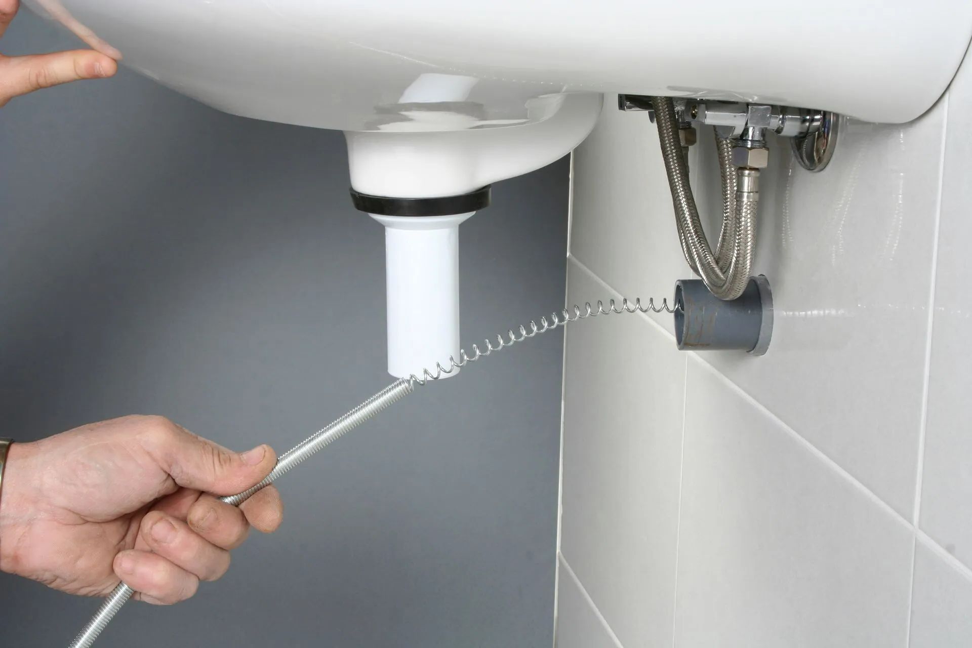 Débouchage d'un canalisation raccordée à un lavabo
