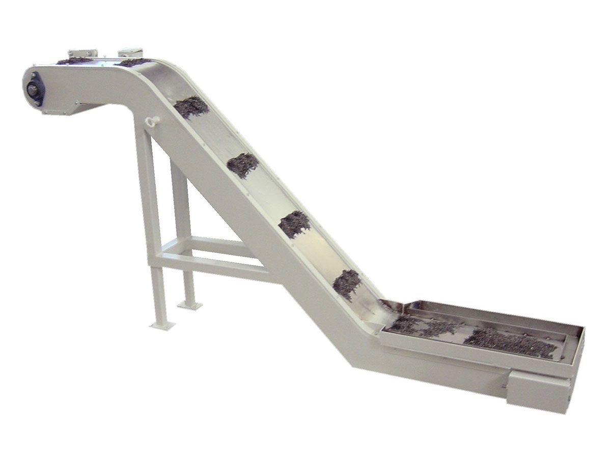 Industriemaschine aus Edelstahl mit Motor und Walzen, vermutlich zur Materialverarbeitung.