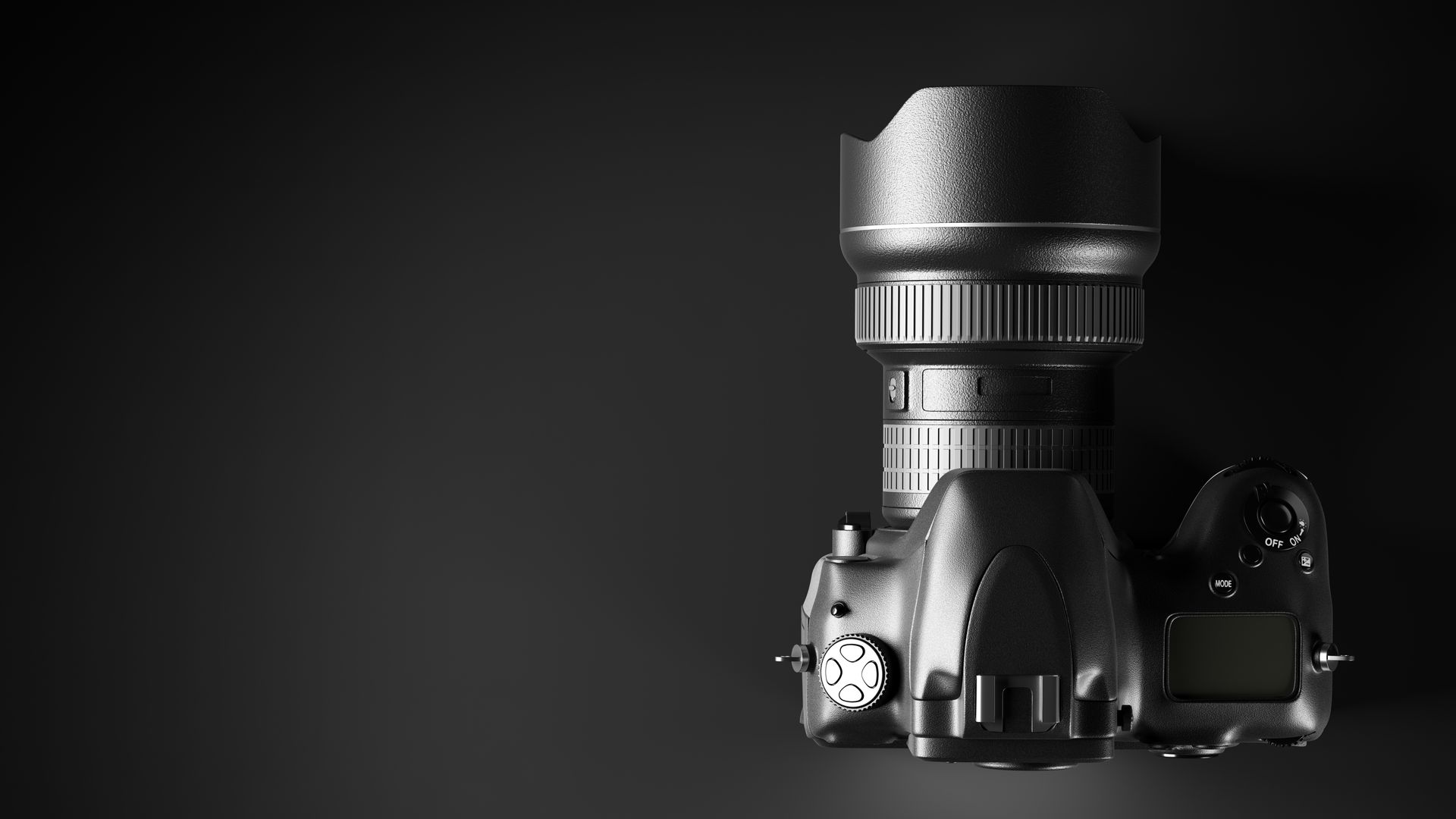 Schwarze DSLR-Kamera auf schwarzem Untergrund, von oben betrachtet.