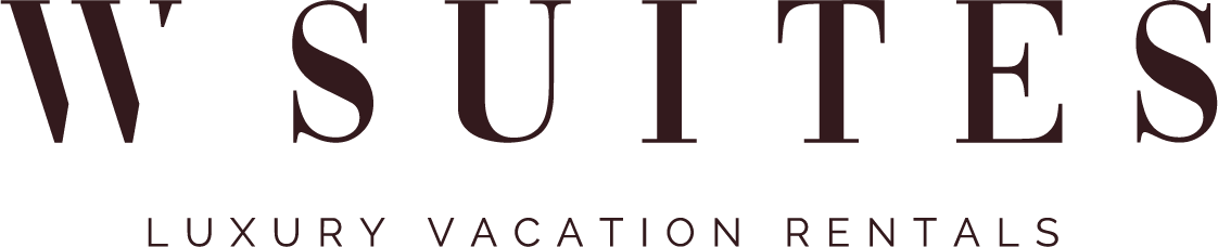 The logo for w suites luxury vacation rentals