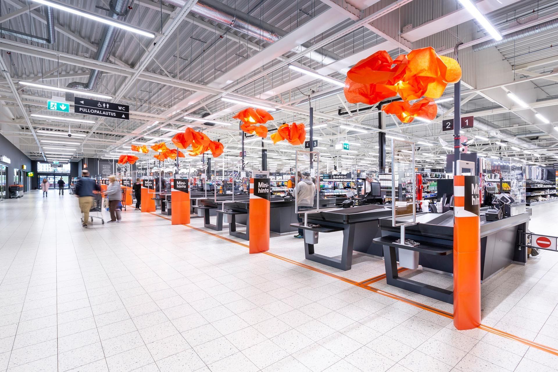 Brändinmukainen kassa-alueen suunnitelma. Oranssit Vivero Tollo valaisimet