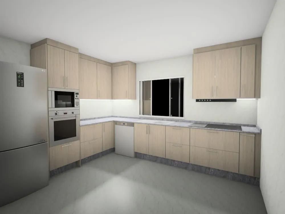 Cocina en forma de L con gabinetes de madera clara, electrodomésticos de acero inoxidable y una ventana.