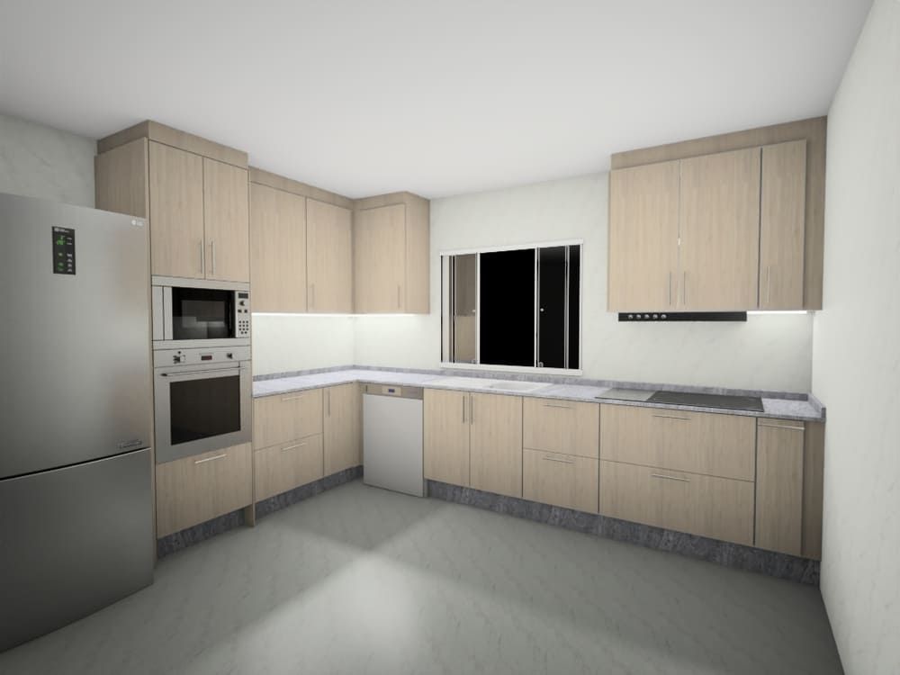 Una cocina moderna con gabinetes de colores claros, electrodomésticos de acero inoxidable y una ventana.