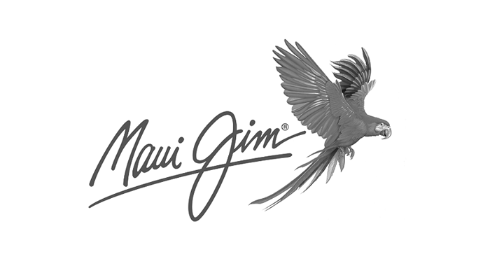 Ein Schwarzweißbild eines Papageis, der in der Luft fliegt.