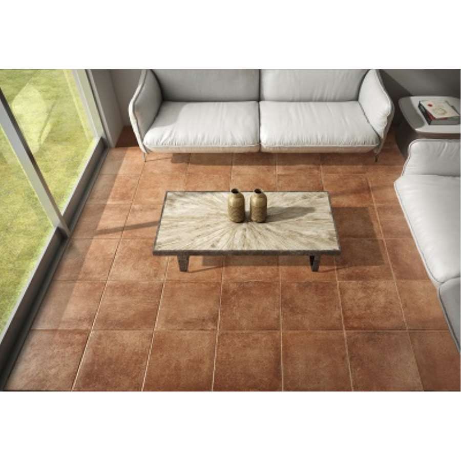 Una sala de estar con un sofá y una mesa de café.