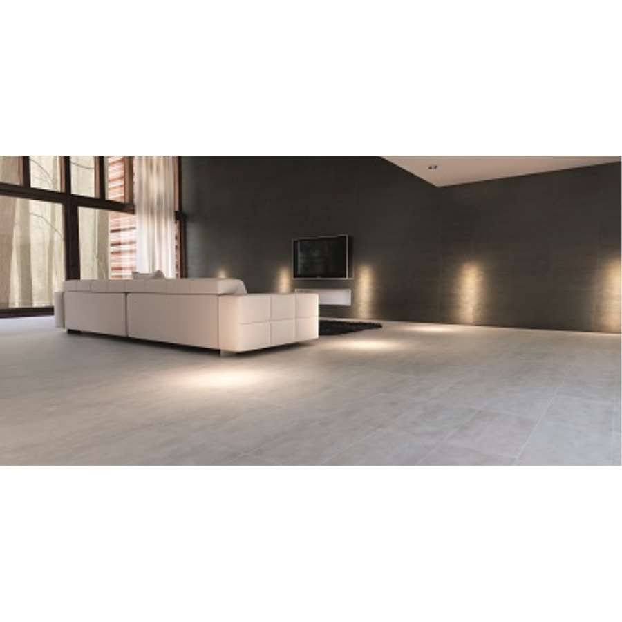 Una sala de estar con un sofá y un televisor en la pared.