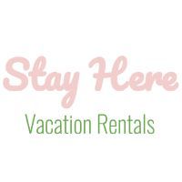 "Stay Here" in pink script font over "Vacation Rentals" in green."