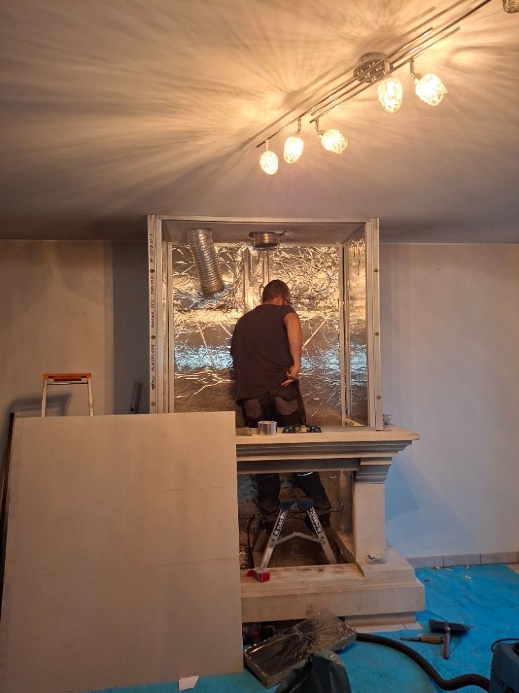 Réalisation de l'installation d'un poêle