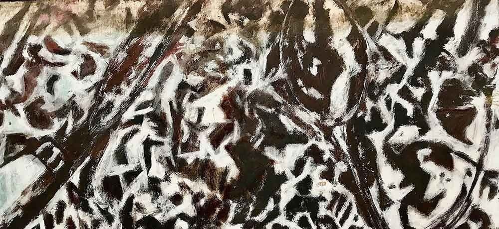 Un primer plano de una pintura en blanco y negro en una pared.