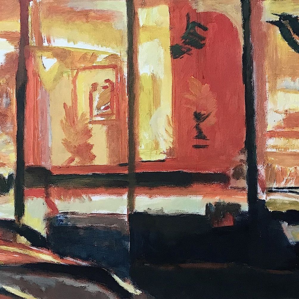 Un primer plano de una pintura de un escaparate de una tienda.