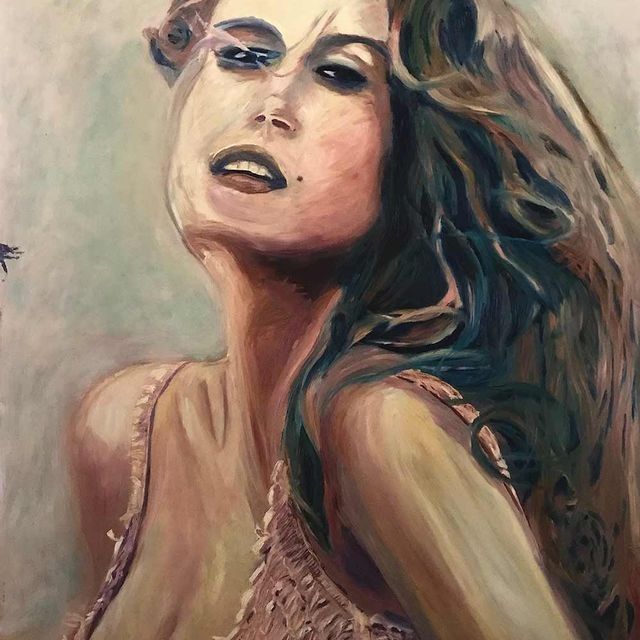 Un primer plano del rostro de una mujer en una pintura.