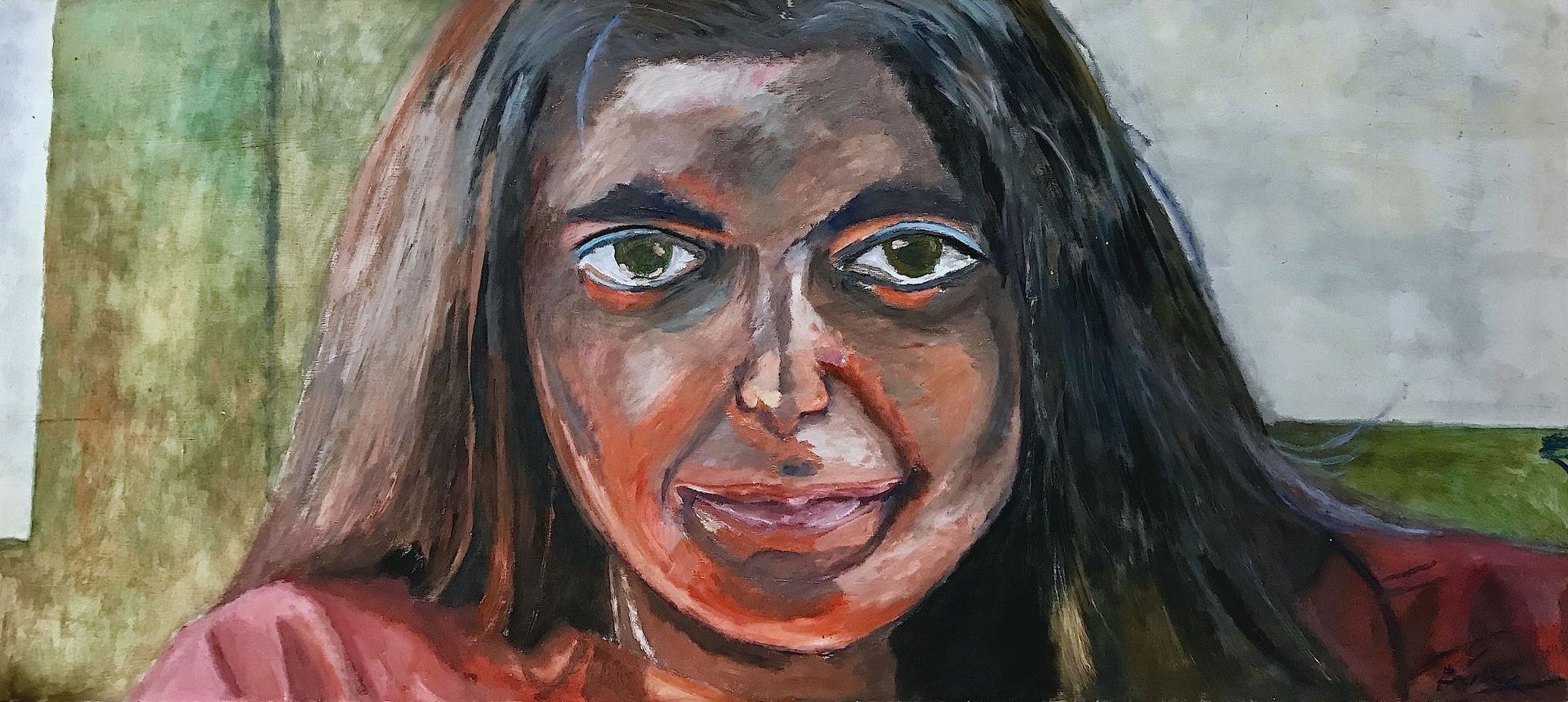 Un primer plano de una pintura del rostro de una mujer.