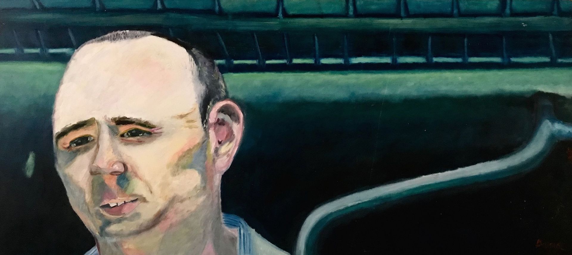 Un primer plano del rostro de un hombre en una pintura.