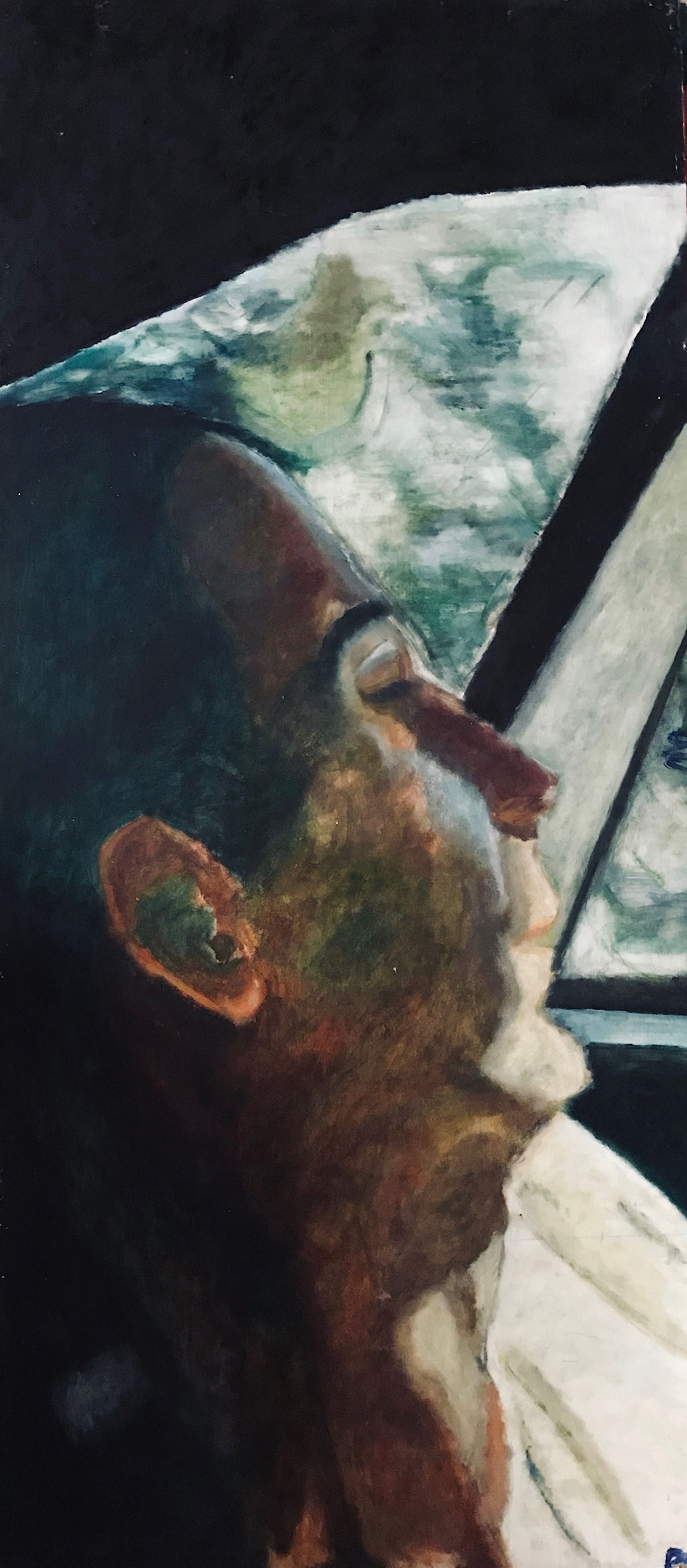 Un primer plano de la cara de una persona en un automóvil.