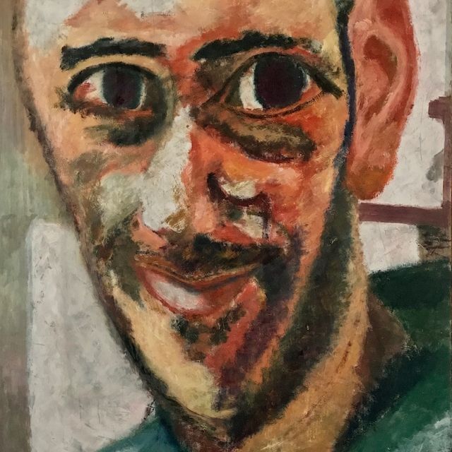 Un primer plano del rostro de un hombre en una pintura.