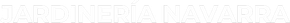 Un gran letrero luminoso blanco de estilo retro que dice "PARKING" en letras may&uacute;sculas y en negrita sobre un fondo oscuro.