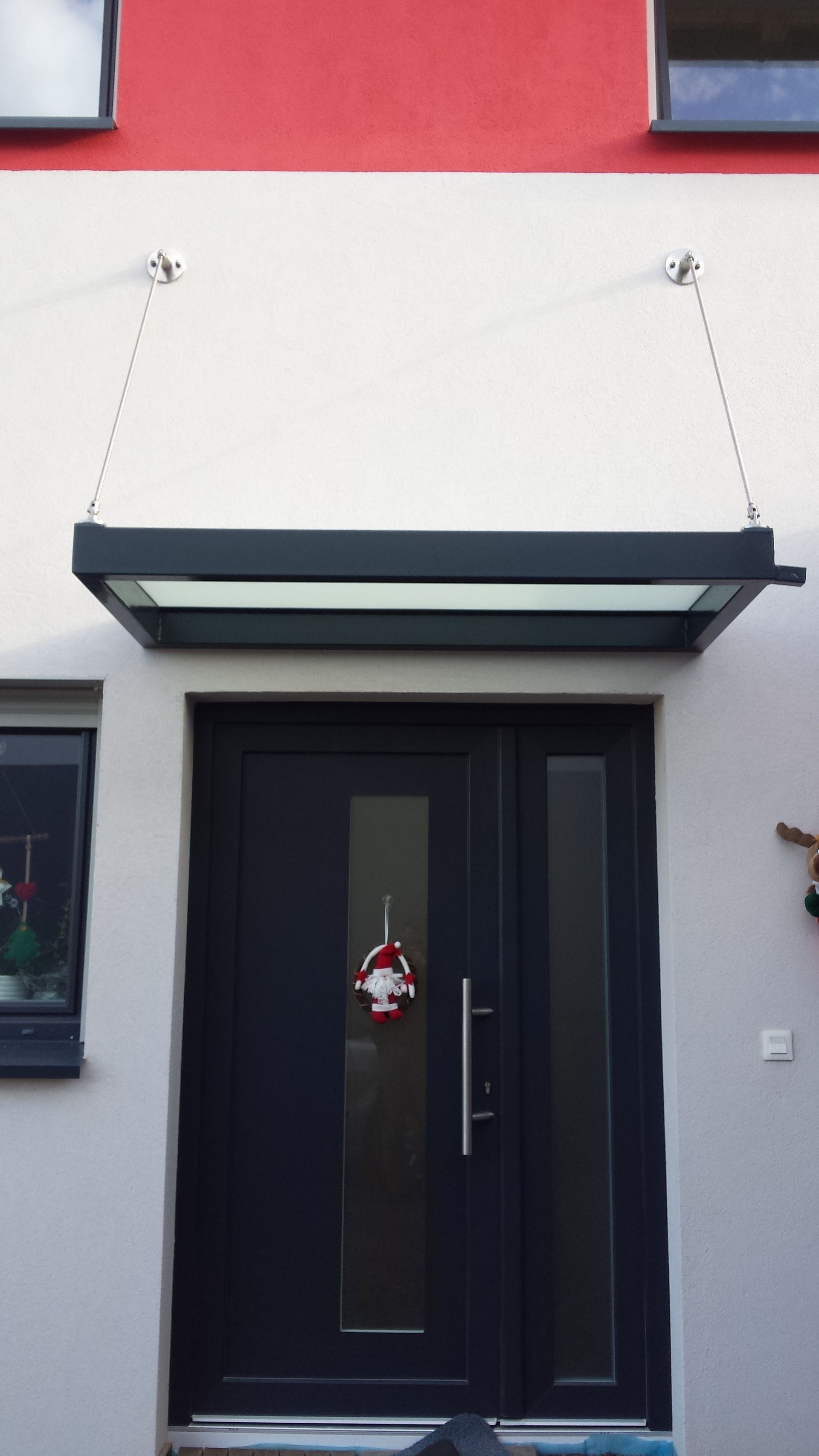 Marquise en verre avec armature métallique