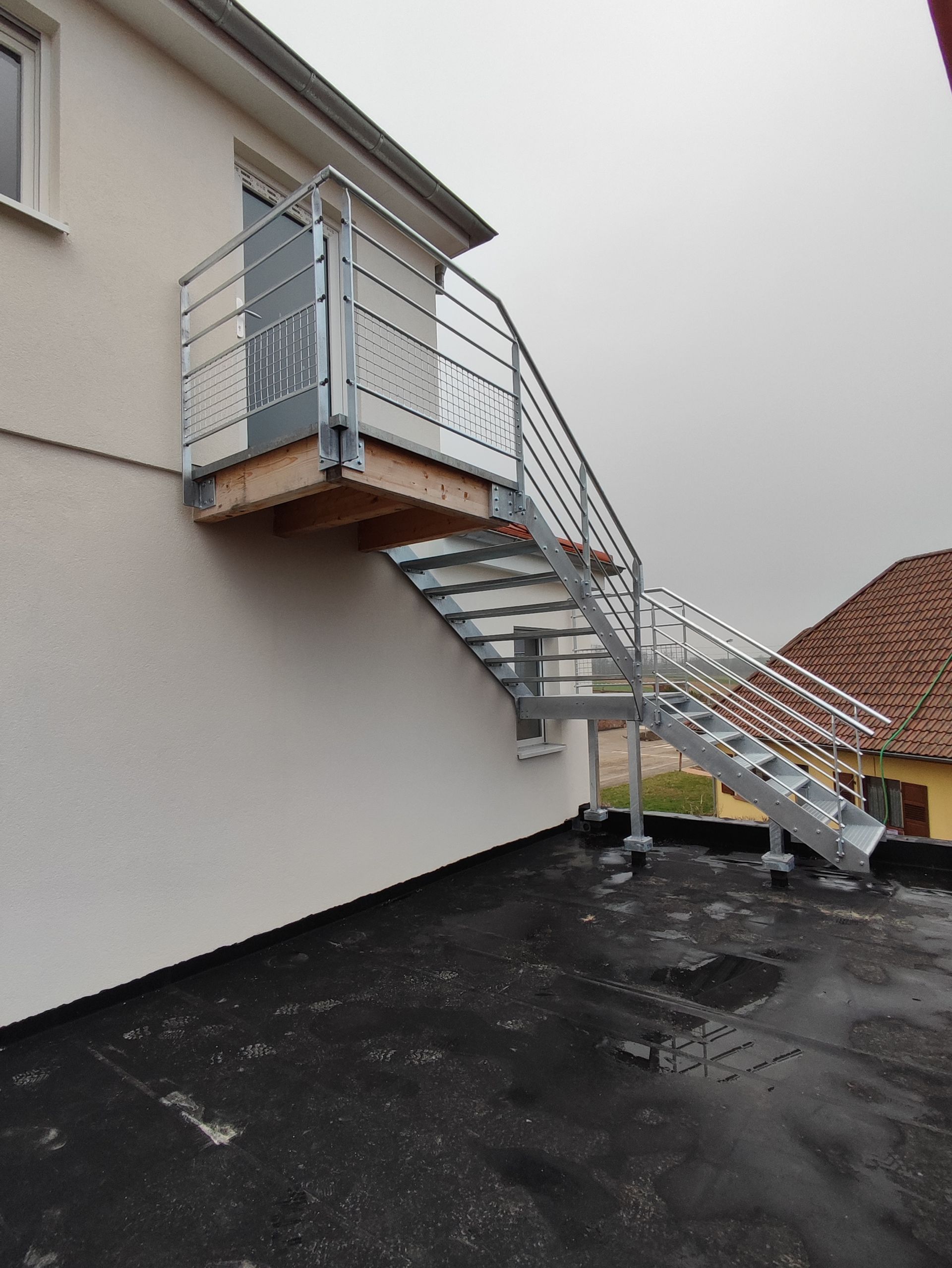 Escalier extérieur avec palier intermédiaire