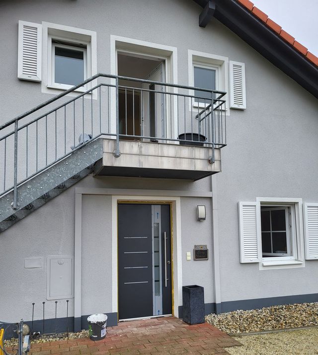 Balkon mit Treppe