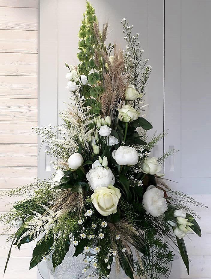 Composition florale avec du muguet