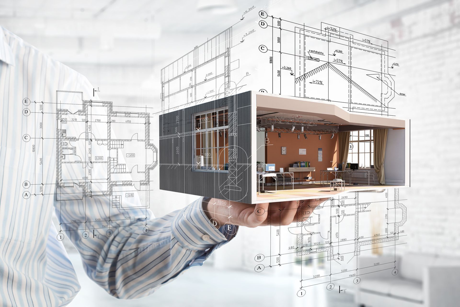Plan architectural d'une maquette de maison moderne tenue dans la main.