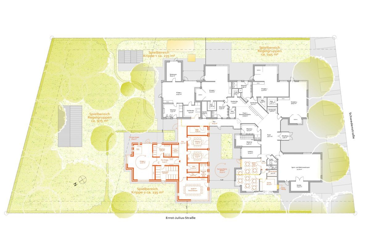 Eine Luftaufnahme des Grundrisses eines von Bäumen umgebenen Gebäudes.