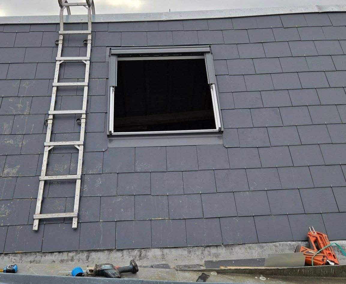 Toiture en ardoise avec Velux