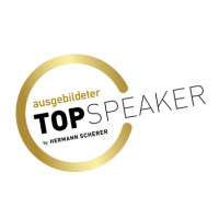 Ein goldener Kreis mit den Worten „Topspeaker“ darin.
