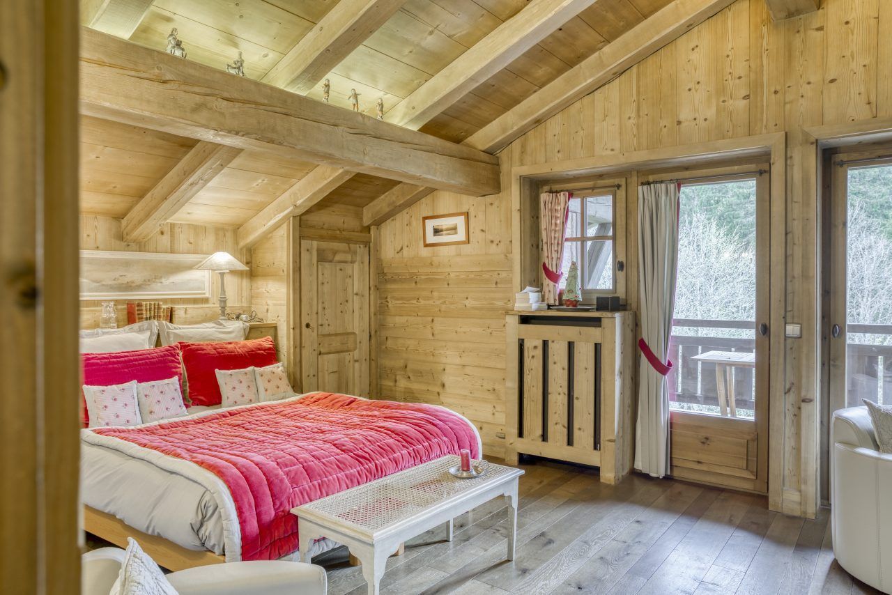 Chambre avec lit double du chalet Mandarine Blanche.