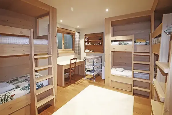 Espace dortoir du chalet Le Bois du Bouchet à Combloux.