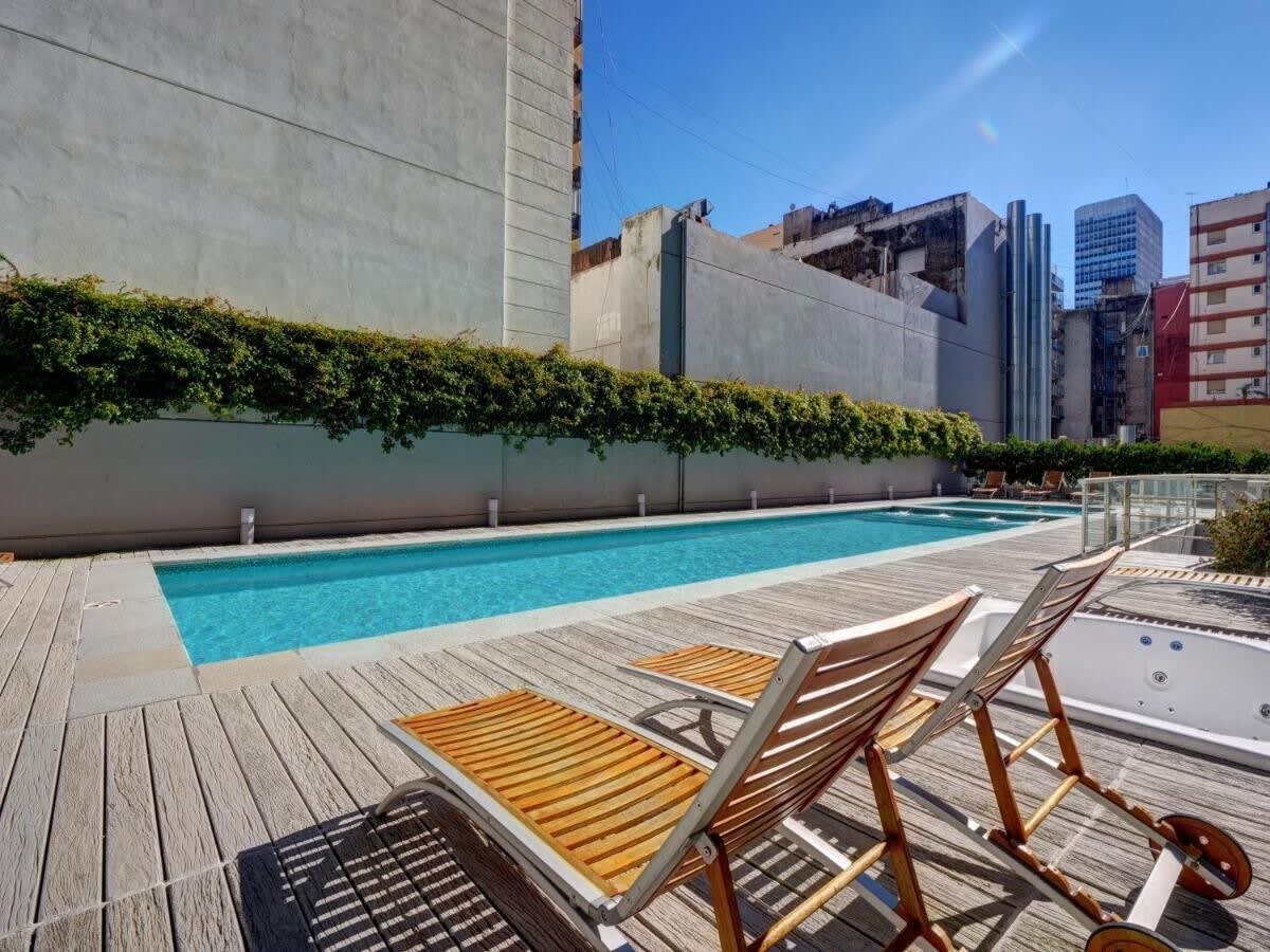 Departamento en el Centro Torre Bellini con Piscina Airbnb Homely Joy