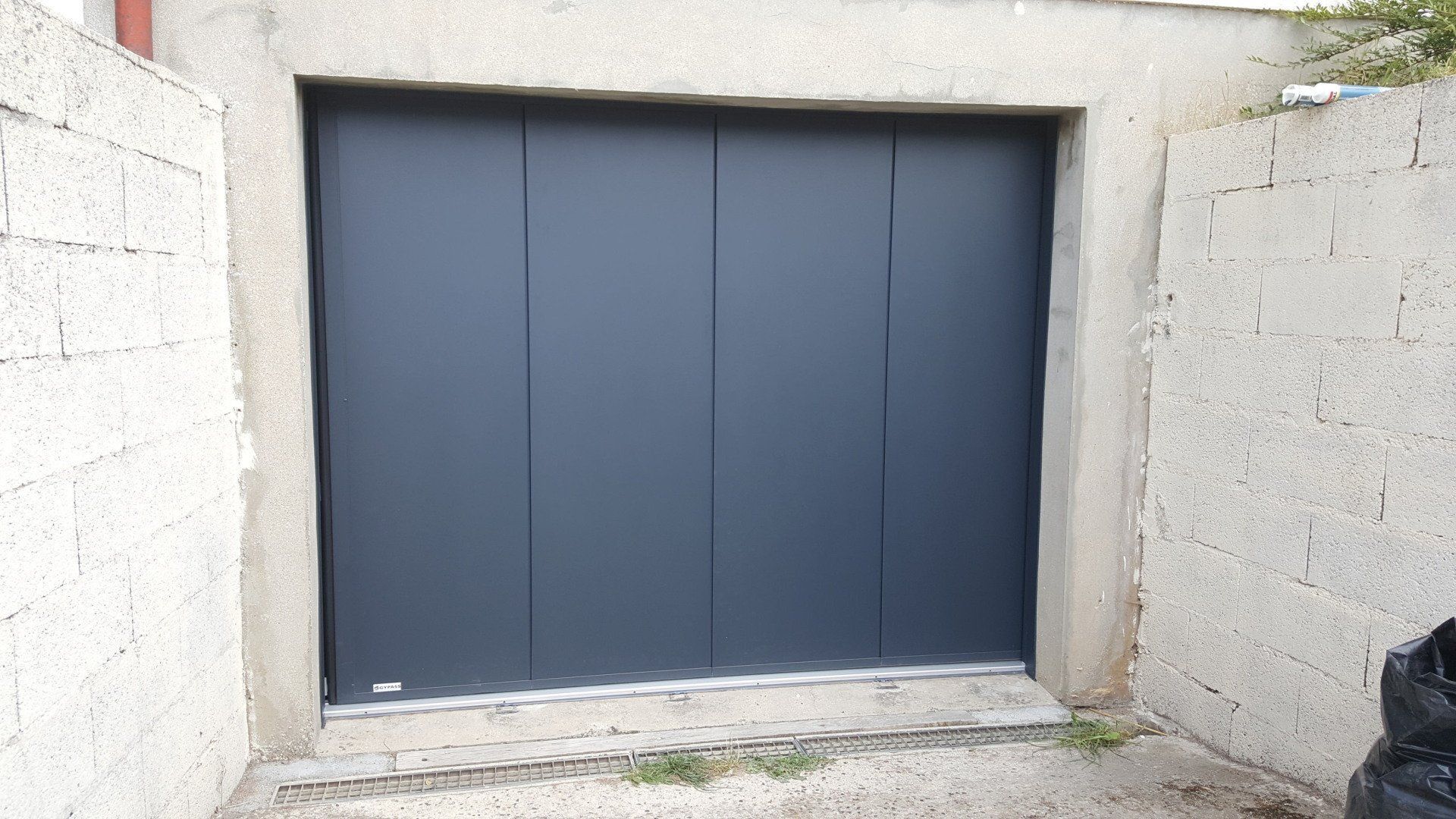 Porte de garage latérale sans motif