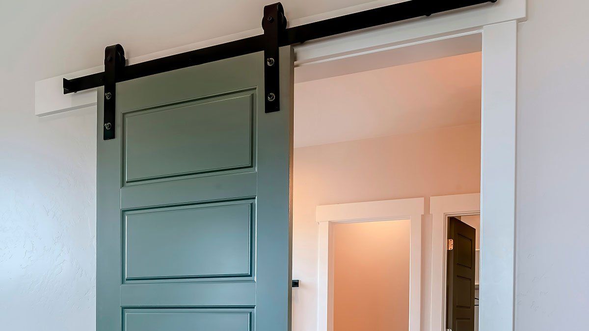 Porte à galandage verte.