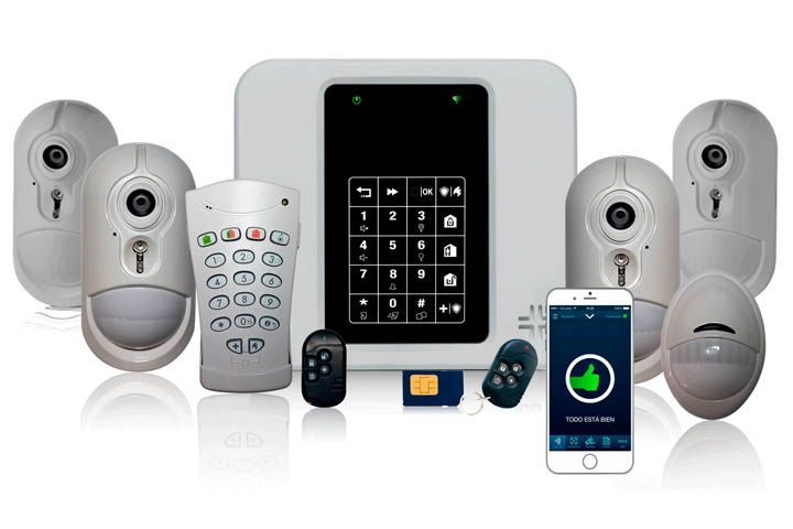 Un sistema de seguridad con un teléfono celular y un control remoto.