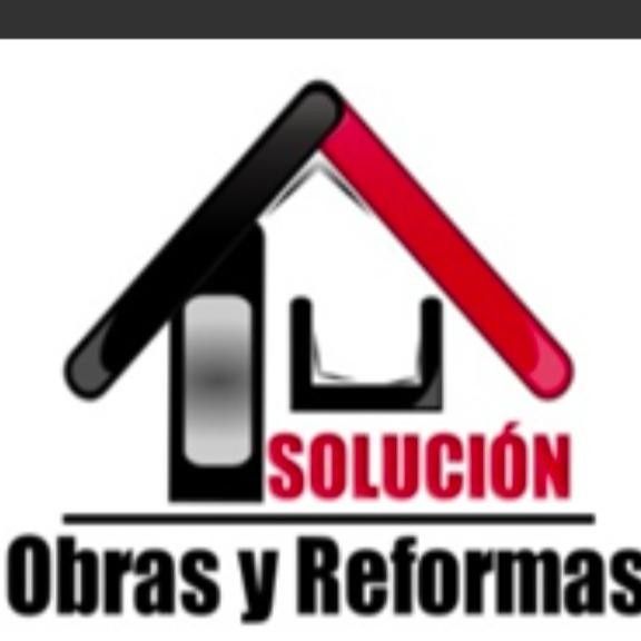 Logo of "Soluci&oacute;n Obras y Reformas." A house outline with a black and red roof. Text reads "SOLUCI&Oacute;N" and "Obras y Reformas."