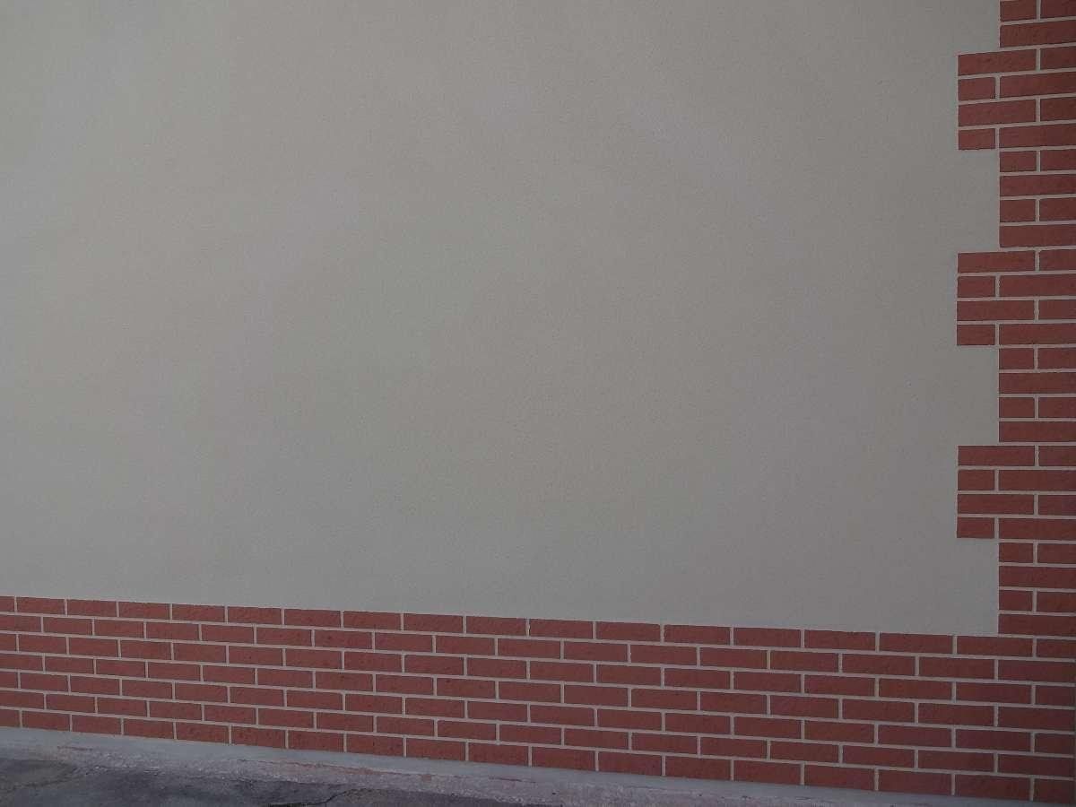 Façade en Enduit matriçé brique , Aisne 02 Laon