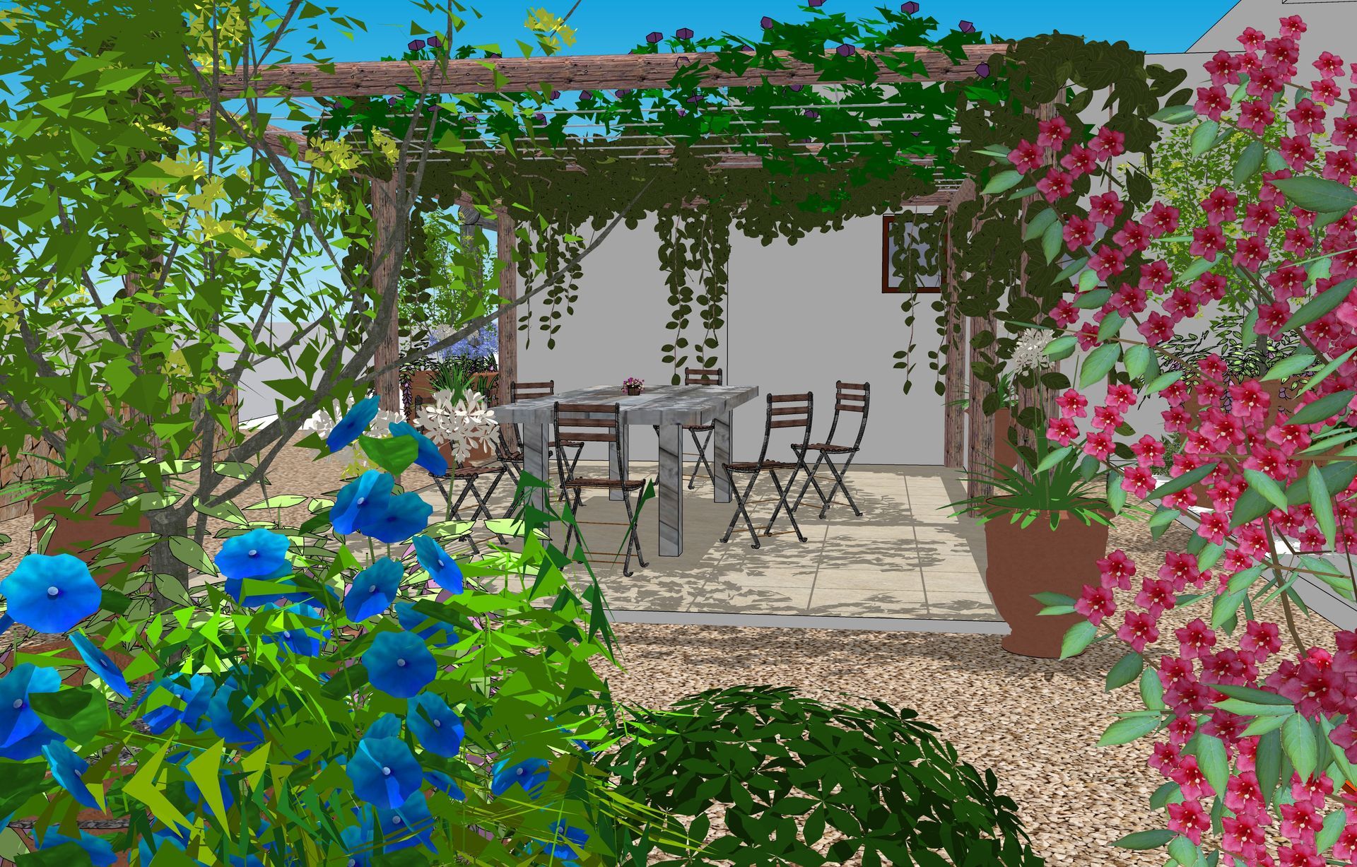 Un patio con mesa y sillas a la sombra de una pérgola, rodeado de flores de colores y vegetación.