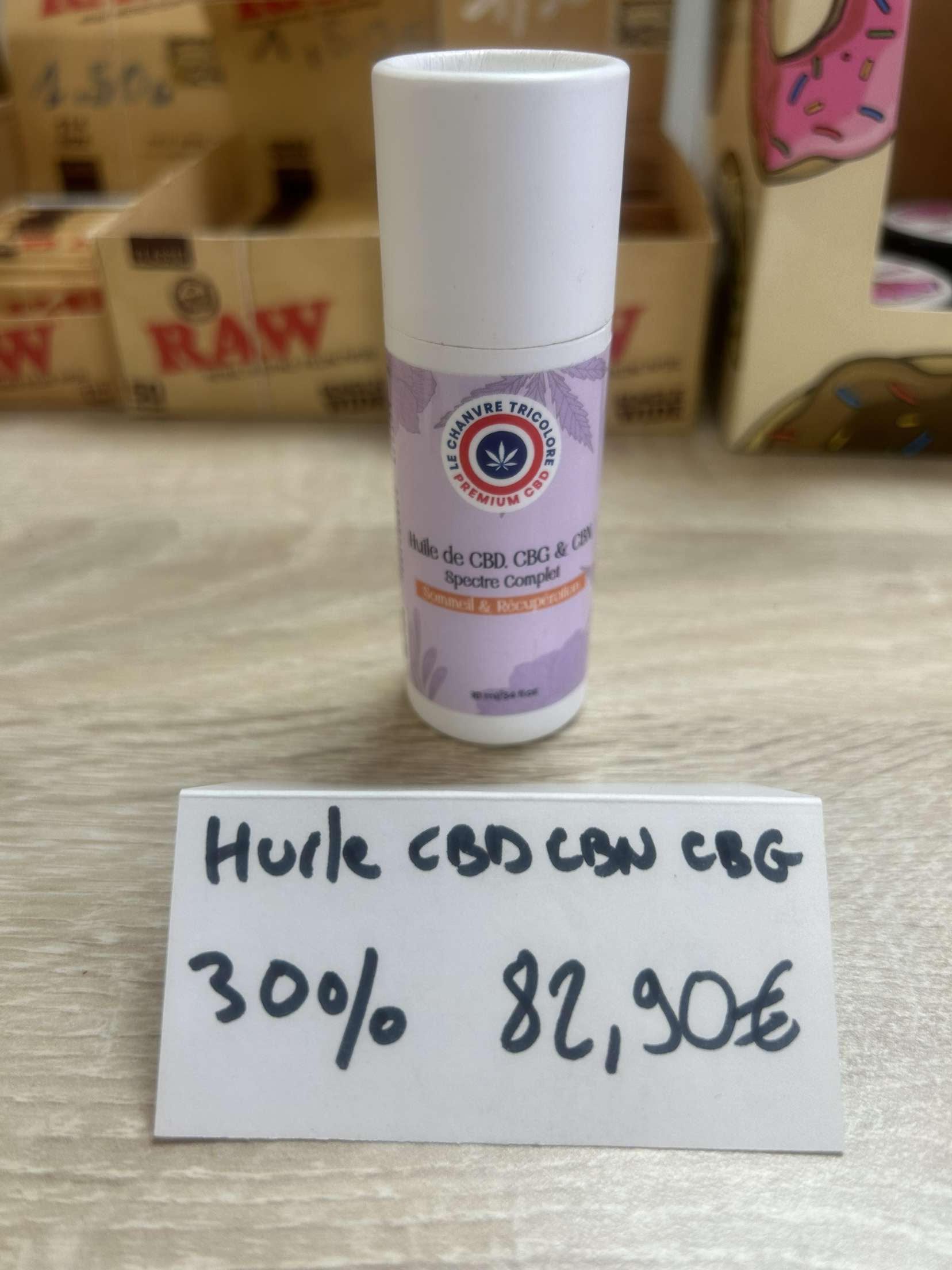 Une bouteille de crème CBD Hurle est posée sur une table