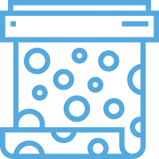 Icono azul de un contenedor con numerosos círculos azules en su interior, parecidos a burbujas, con una parte superior plana y una bandeja en la parte inferior.