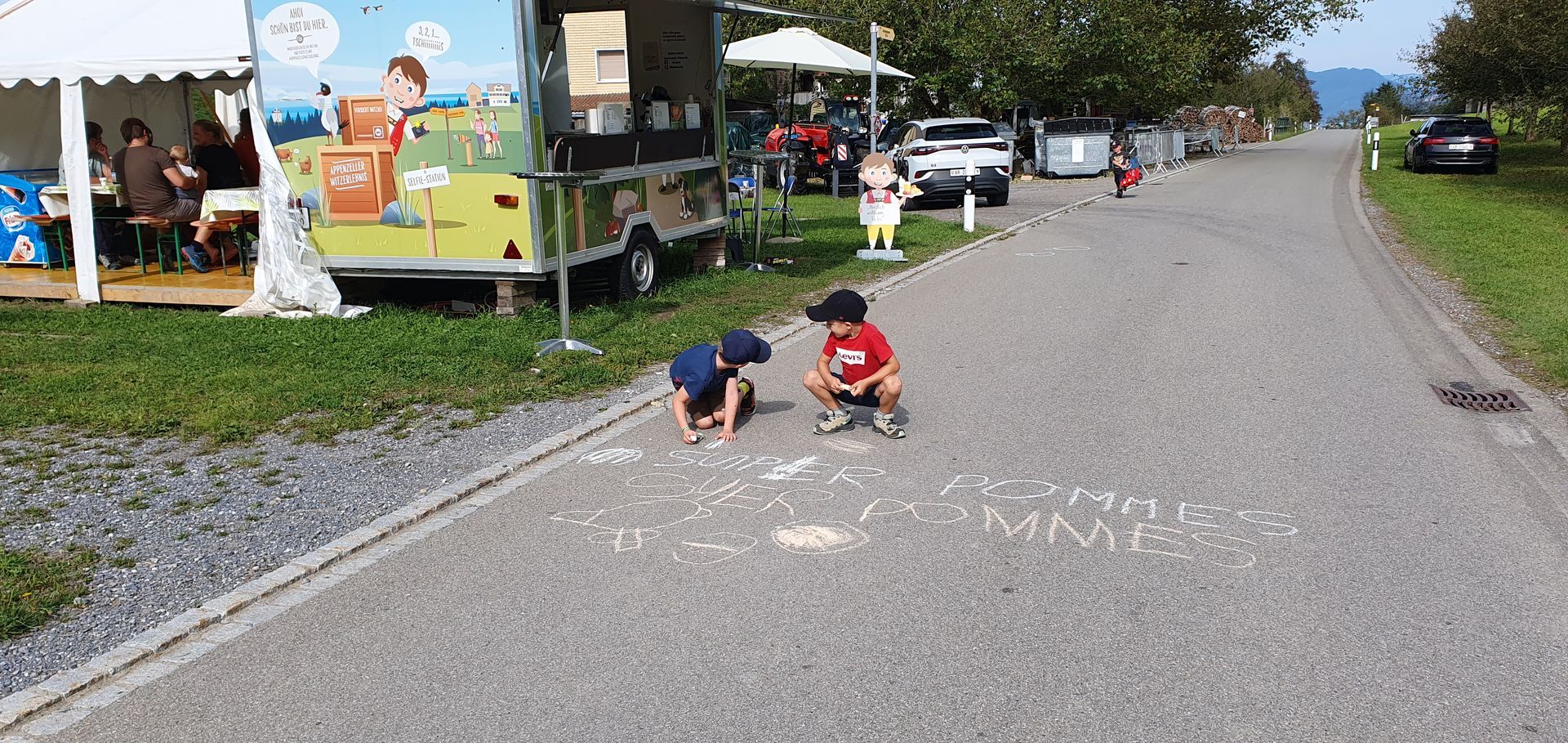 Chef in black gloves garnishes toast with arugula and beets. Various food prep, including figs, surround.